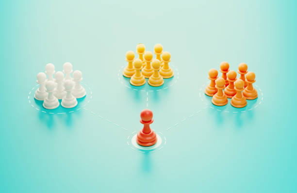 istock Groups Of Colored Pawns On Blue Background 2195877686