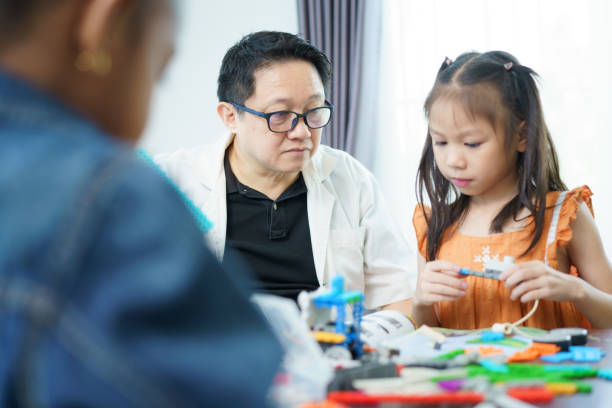 istock Group of diverse children enjoy learning about the STEM. 2195885325