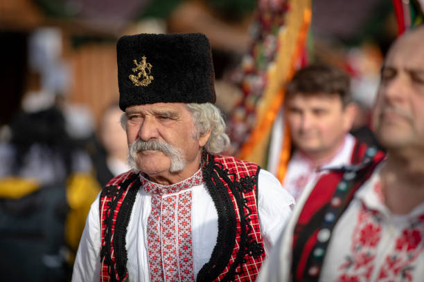 Pernik, Bulgaria - January 24, 2025: 31st Anniversary Masquerade Festival in Pernik Bulgaria. People with masks called Kukeri dance and perform a ritual to scare away evil spirits.