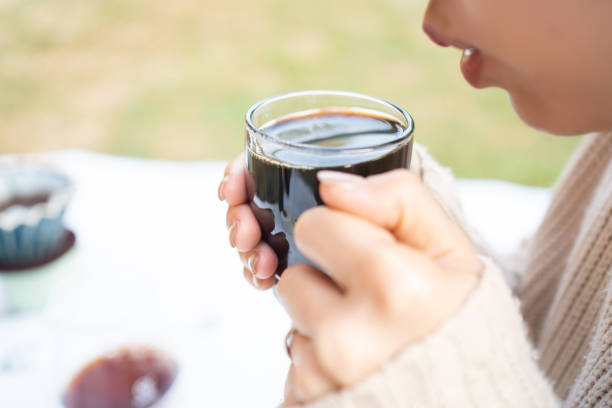 istock Asian woman enjoy drinking hot black coffee. 2195891045