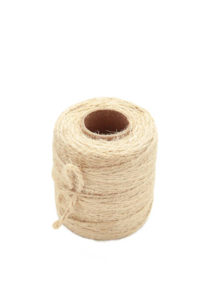 istock Natural jute twine string rope isolated on white background 2195892563