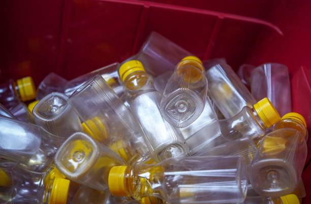 Used plastic bottles background. Conservation ecological, natural friendly, world waste management. Horizontal seamless background.