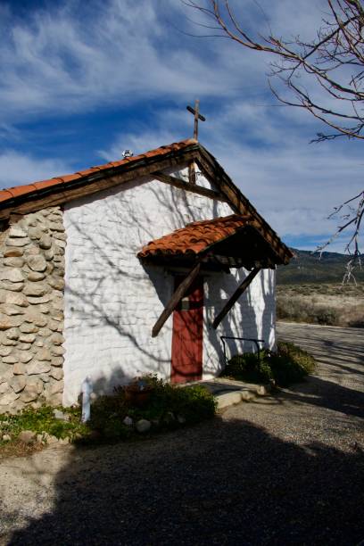 istock Spanish adobe country church in a remote valley 2195895395
