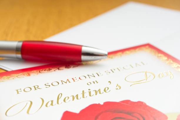 istock Valentine's day card with pen on desk 2195898757