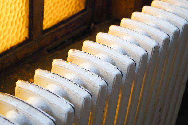 istock The Radiator Heating System in a Cozy Room Designed for Maximum Comfort and Style 2195904417