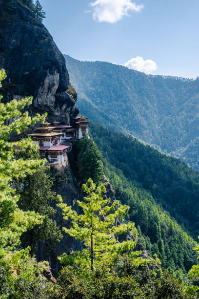 istock Takstang Monastery is perched on ledge above steep cliffs, Bhutan 2195905533