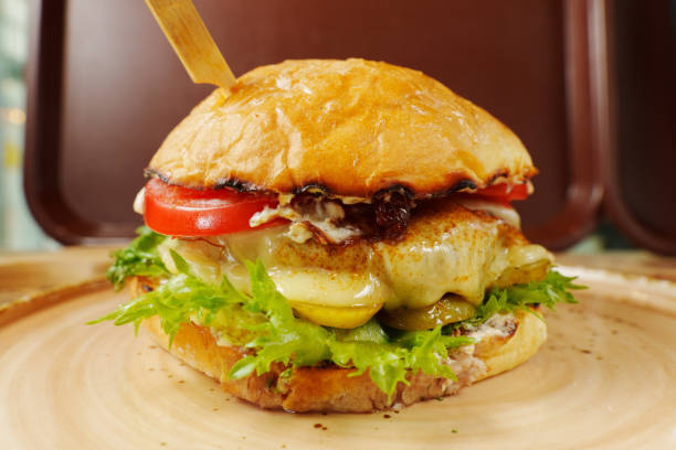 istock This delicious cheeseburger features two layers of melted cheese, crisp lettuce, and a succulent beef patty 2195913460