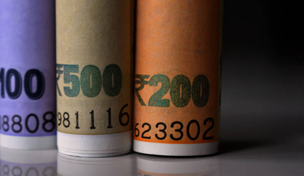 Indian union budget concept with currency notes placed vertically in focus.