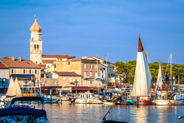 Island town of Krk waterfront sails view, Kvarner region of Croatia