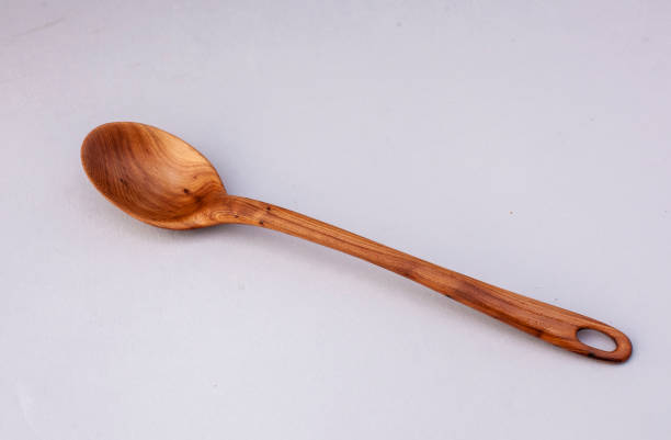 istock Wooden kitchen utensils stacked view close up 2195923578