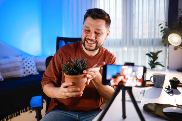 istock Man Talks About Plant Care 2195924234