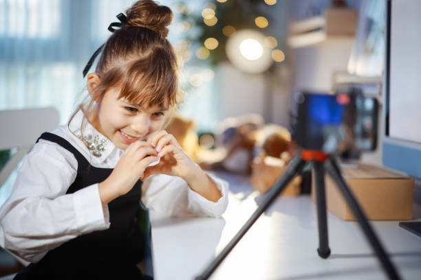 istock Young influencer filming vlog for his channel. 2195927380