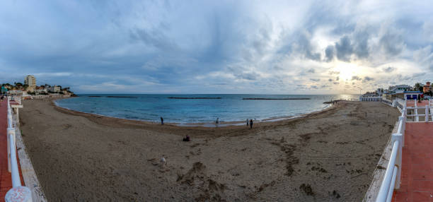 Santa Marinella, Lazio, Italy - January 25, 2025: The beach seen from the promenade of Santa Marinella. The City of Santa Marinella, overlooking the Tyrrhenian Sea, stands on the coast of southern Etruria, in the Maremma of Lazio