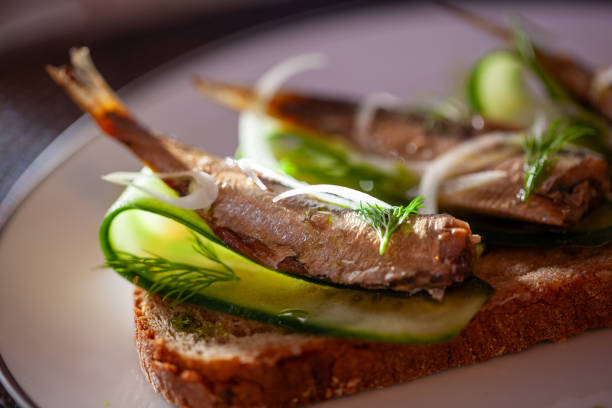 istock Open faced sandwich with sardines and dill 2195941127