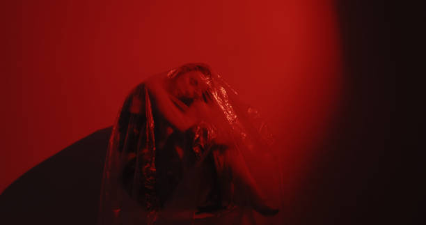 istock Woman protection sleeping beauty depressed red 2195941900