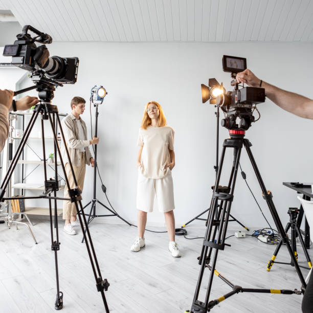 istock Backstage posing woman photo studio equipment 2195942461