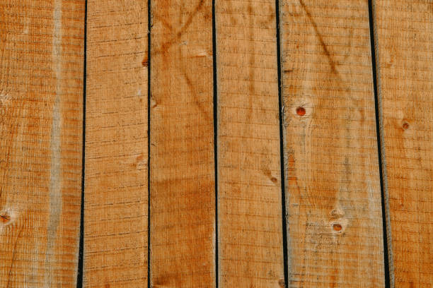 istock Wooden planks arranged in a rustic pattern showcasing natural textures and colors in a warm, inviting setting 2195942604