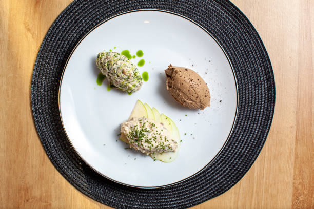 istock Gourmet appetizer platter with pate and salad 2195942613