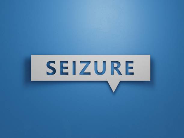 istock SEIZURE word on notebook, stethoscope and green plant.Minimalist Abstract Design With White Cut Out Paper.3D rendering on blue background. 2195942973
