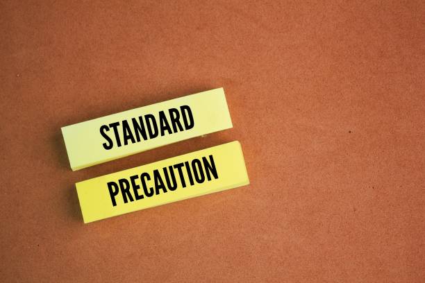 istock colored paper with the word standard precaution. minimum infection prevention practices that apply to all patient care, regardless of suspected 2195945649