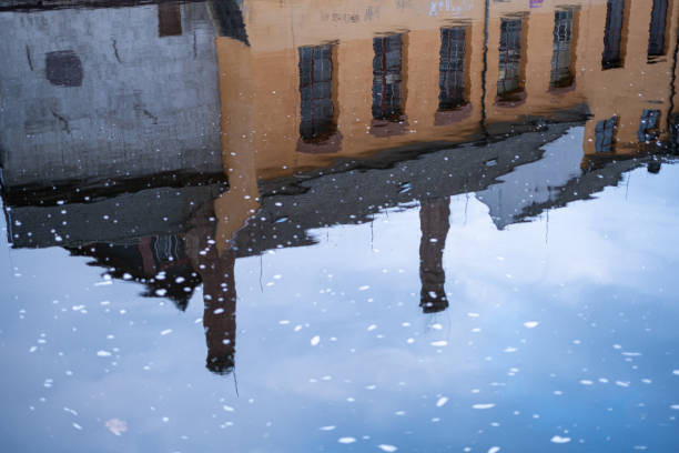 istock Reflection of Historic Building in Rippling Water 2195948277