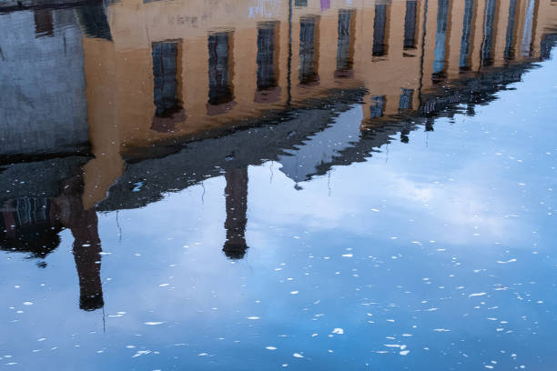 istock Reflection of Historic Building in Rippling Water 2195948278