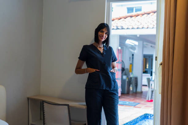 istock Housekeeper does her homework in the hotel while looking at a portrait 2195949177