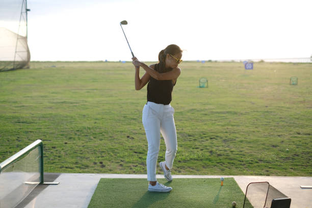 istock Mature Asian Woman Practicing at the Driving Range 2195952073