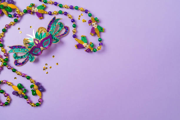 istock Carnival or mardi gras party background with carnival masks, beads and throws 2195952872