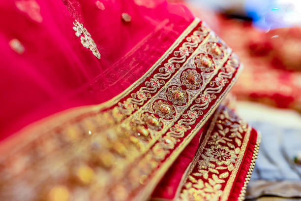 istock Indian bride's wedding outfit fabric, textile and pattern close up 2195964140