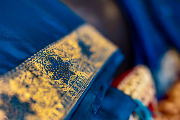 Indian bride's wedding outfit fabric, textile and pattern close up Indian bride's wedding outfit fabric, textile and pattern close up pure Kanjeevaram saree stock pictures, royalty-free photos & images