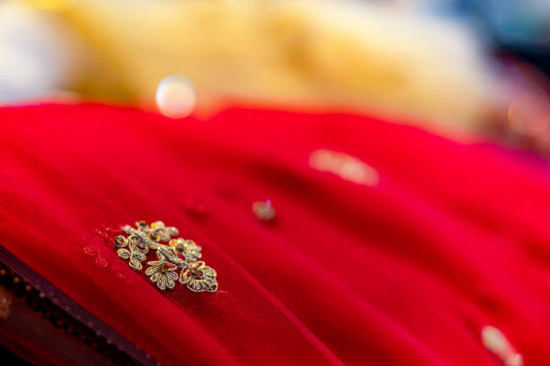 Indian bride's wedding outfit fabric, textile and pattern close up