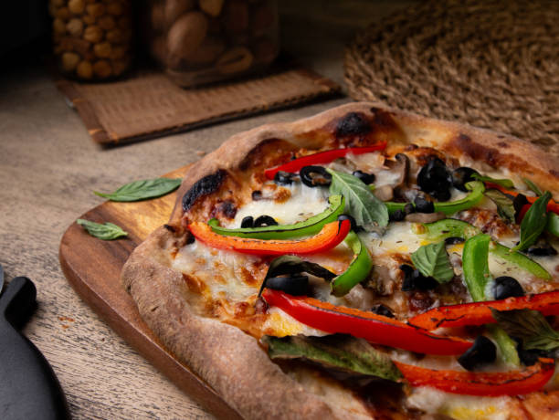 istock Homemade Sourdough pizza on Wooden Table. 2195965832