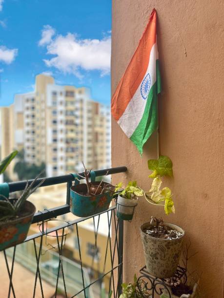 istock An Indian tricolour flag flutters majestically against a clear sky 2195968828