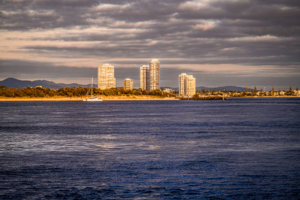 istock The Spit is a 5km long, relatively undeveloped, sandy isthmus starting at Main Beach and finishing at the seaway where Broadwater meets the Pacific Ocean. 2195969663
