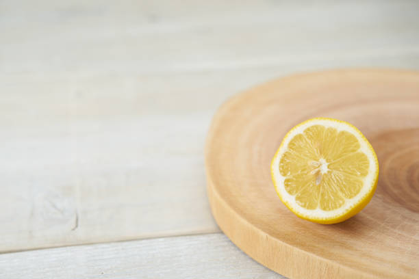 Image of fresh lemons on an indoor table