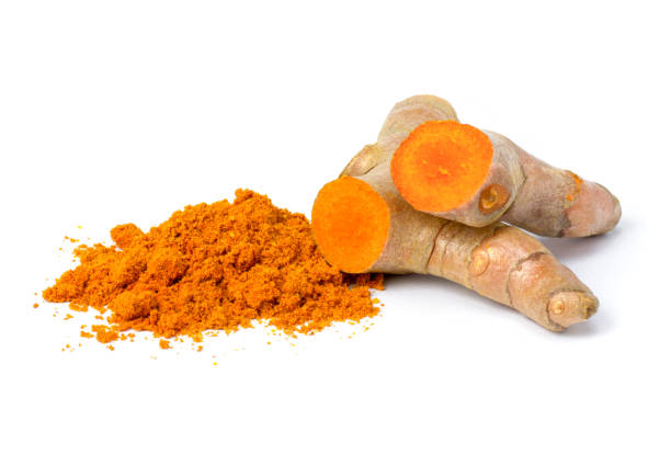 istock Turmeric powder and turmeric root 2195974545