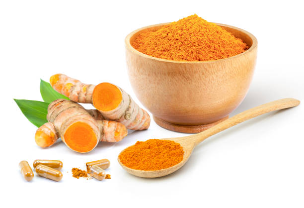 istock Turmeric powder and herbal medicine capsule 2195976020