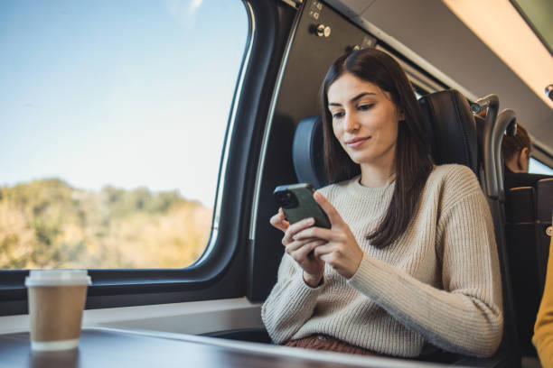 istock Young female tourist rides a train 2195976039
