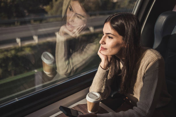 istock Young female tourist rides a train 2195976065