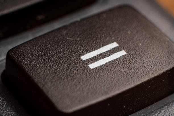 istock Closeup view of electronic keypad highlighting the equal sum button used for calculations 2195976706