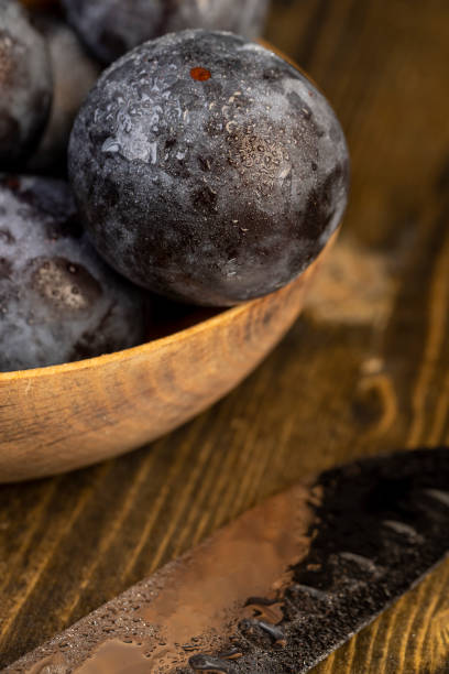 istock purple plums on the table during cooking 2195979723
