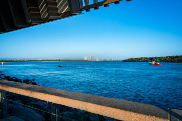 istock The Spit is a 5km long, relatively undeveloped, sandy isthmus starting at Main Beach and finishing at the seaway where Broadwater meets the Pacific Ocean. 2195985228