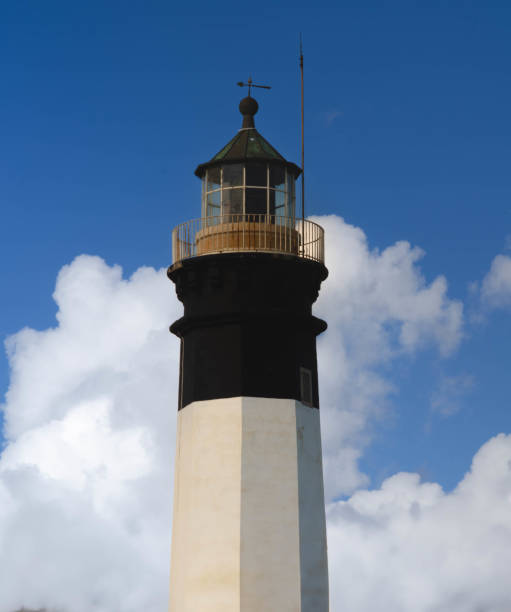 istock Majestic Lighthouse Against Blue Sky in sunny day 2195985288
