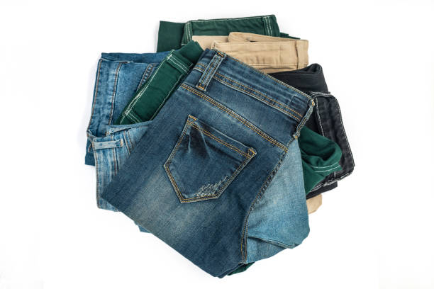 istock Blue and color jeans isolated on white 2195985973