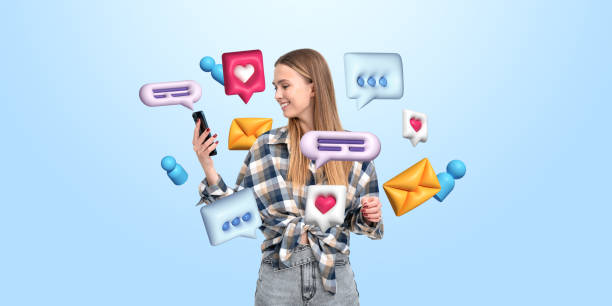 istock Woman using smartphone surrounded by colorful chat and social me 2195986571