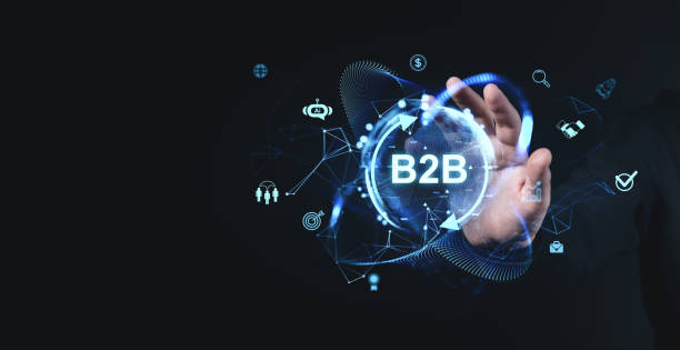 istock B2B technology concept with holographic icons and hand reaching out. 2195987065