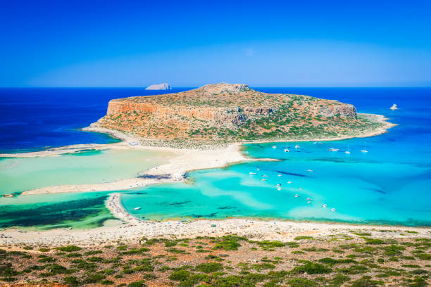 istock Balos Lagoon, stunning landscape with turquoise waters, white sand, and dramatic cliffs on Crete, Greece. 2195988386