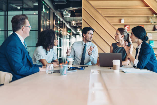 istock Discussing and taking important business decisions together 2195989514