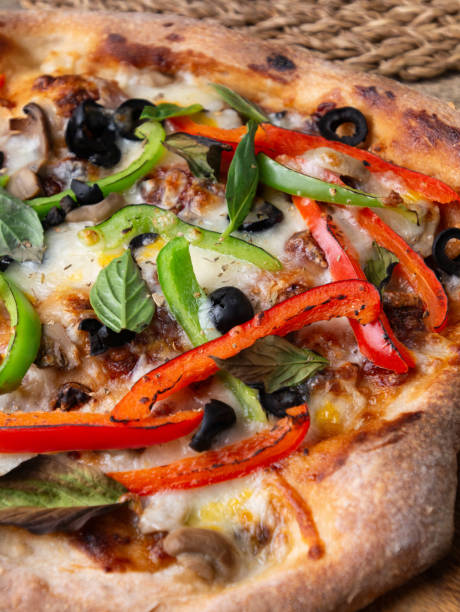 istock Homemade Sourdough pizza on Wooden Table. 2195989688